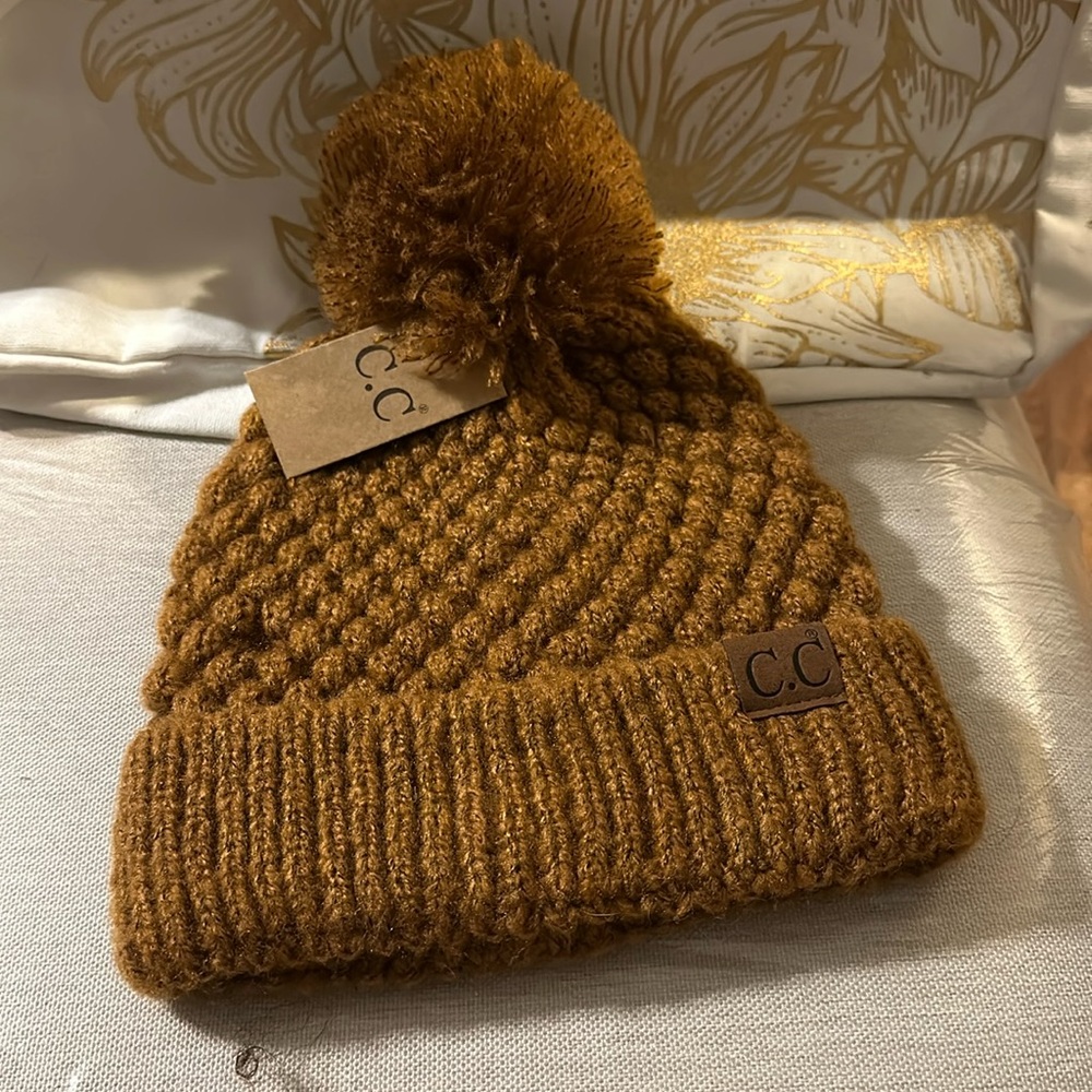CC beanie with a pom